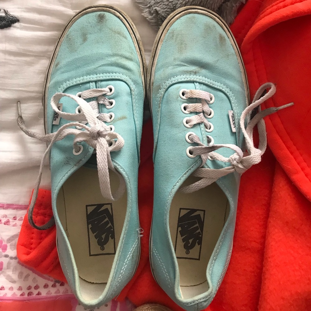 Very worn baby blue vans